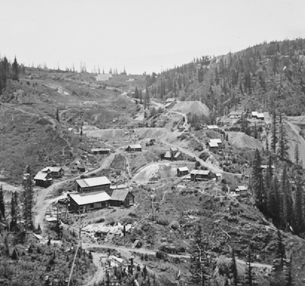 Vintage black and white photograph of a mining settlement nestled on Aspen Mountain on tourtellotte park
